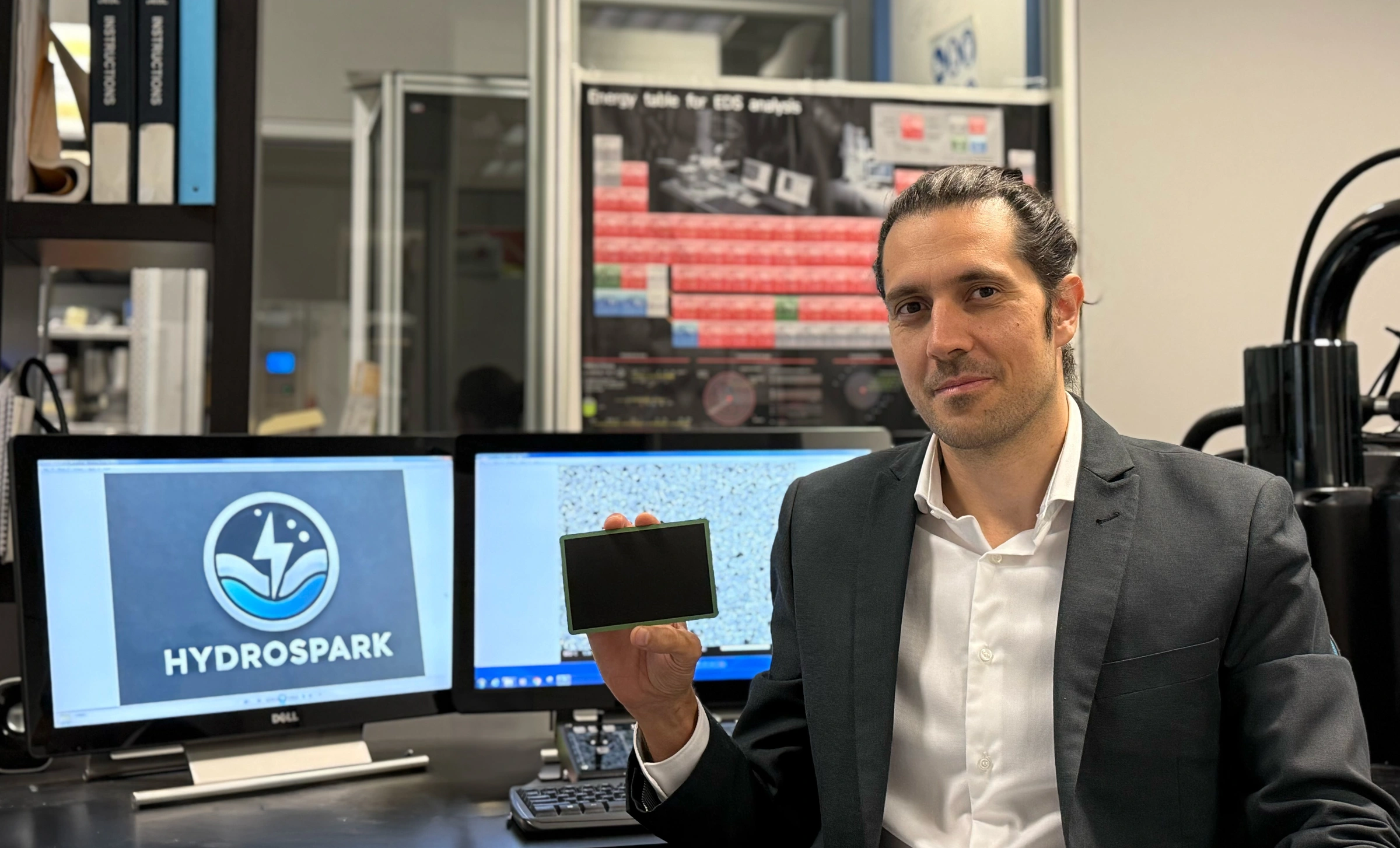Fabrizio Gualandris, Hydrospark CEO holding a Solid Oxid Cell.jpg